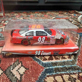 Red diecast race car model 98 in clear display box