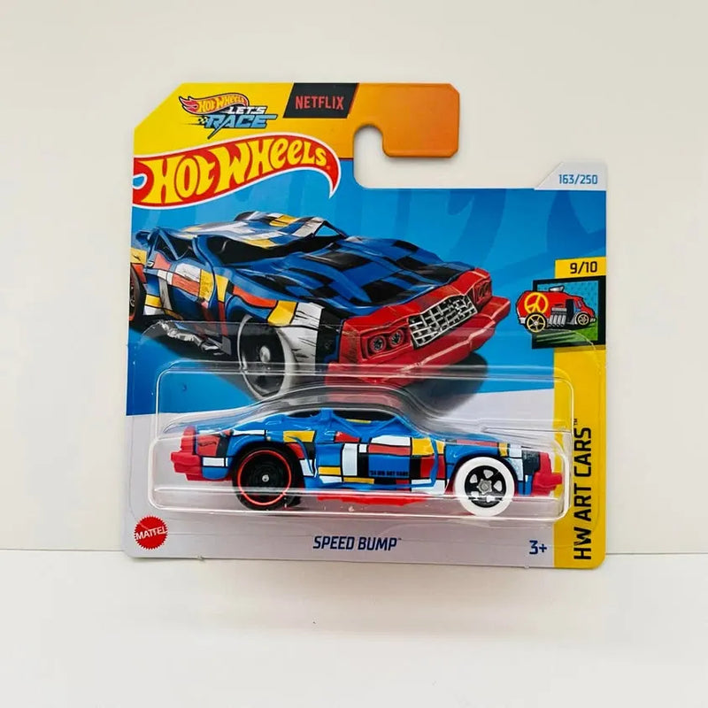 Hot Wheels diecast speed bump car on card, blue and red with yellow accents