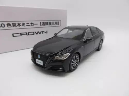 Mini diecast Toyota Crown sedan model in dark black pearl finish