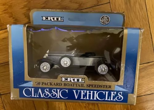 Silver 1:43 diecast Packard Boattail Speedster car in box, ERTL Classic Vehicles