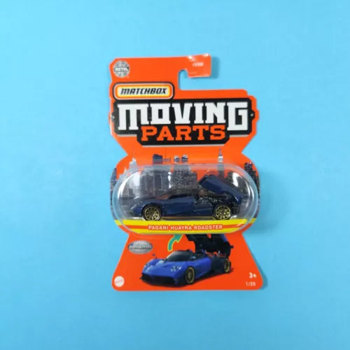 Blue diecast roadster car in blister pack, Matchbox Moving Parts toy model