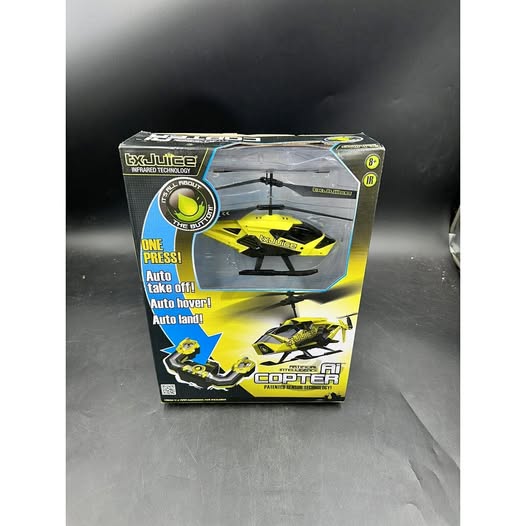 TxJuice AiCopter drone in yellow and black retail box with drone graphics