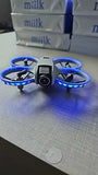Foldable quadcopter drone with front camera and blue LED ring prop guards