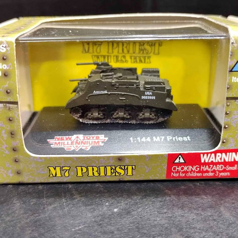 Diecast M7 Priest tank model in display box, gray-black with raised gun