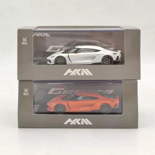 Diecast supercar model set in display box, showing white and orange cars