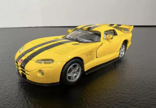 Diecast toy car, yellow with black racing stripes, front three-quarter view