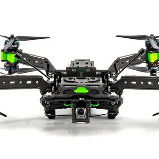 Quadcopter drone with camera module, black frame and green accents