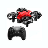 Red mini RC drone with four propellers and black remote controller