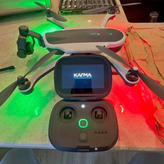 GoPro Karma drone with open controller and screen, white body