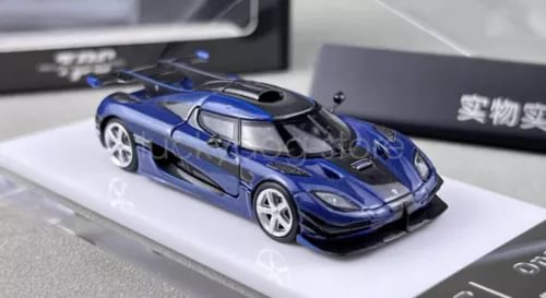 Blue diecast race car model with open hood detail