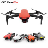 Orange and black quadcopter drone with camera, shown with angled views