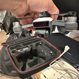 Foldable drone controller in open carry case with built-in screen