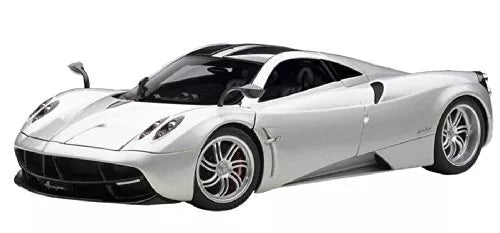 1/18 diecast sports car in silver with black accents, front three-quarter view