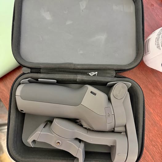 DJI Osmo Mobile 3 gimbal in hard case, light gray handheld stabilizer