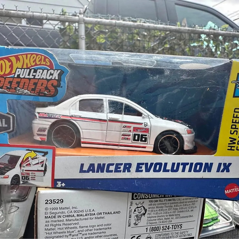 Hot Wheels LANCER EVOLUTION IX diecast in clear blister, white car with decals