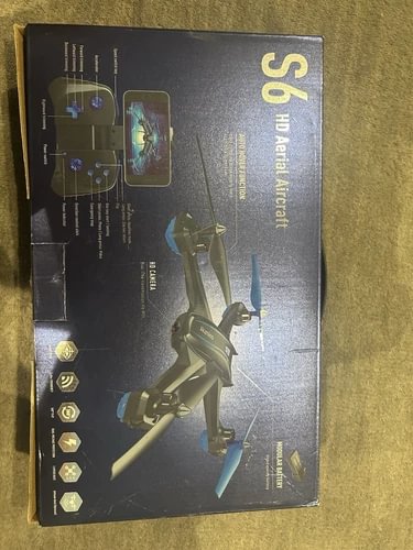 Aerial drone aircraft packaging box with printed drone and controller illustrations