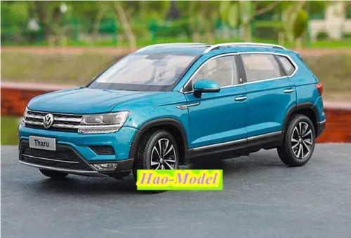 Teal Volkswagen Tharu 2019 diecast metal model car, front 3/4 view