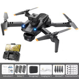 Foldable quadcopter RC drone with 4K camera, four propellers and blue status lights