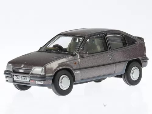 Dark grey diecast model car with silver wheels and front grille detail