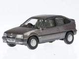 Dark grey diecast model car with silver wheels and front grille detail