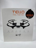 Black quadcopter drone with four propellers, compact folding design