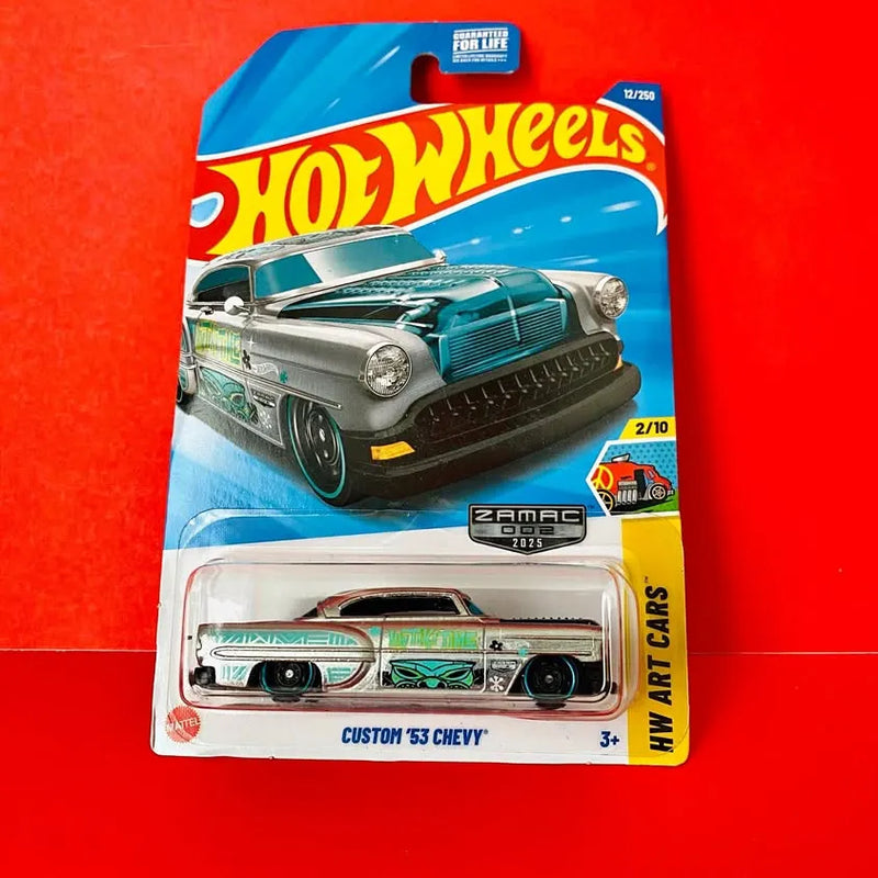 Hot Wheels 1953 Chevy diecast car, teal and silver, in blister packaging