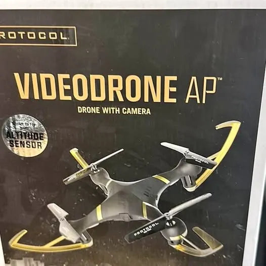 Camera drone quadcopter with four propellers, shown on product box