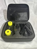 Compact drone accessory case with yellow propellers and charging cables, black mesh