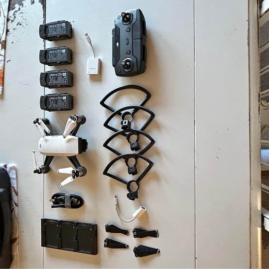 DJI Spark drone kit with remote controller, batteries, propellers and charger