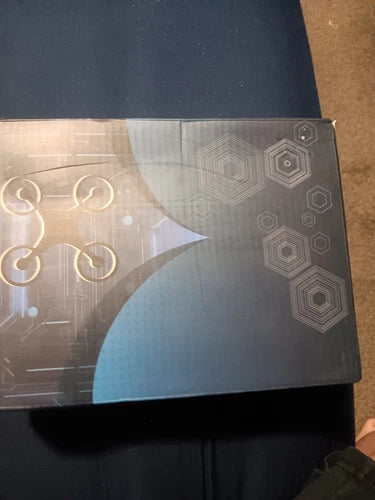 Drone device box with printed geometric pattern and hex icons