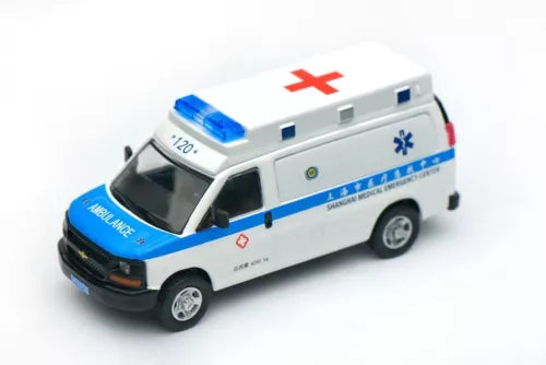 Diecast ambulance van toy, white with blue stripe, roof light and red cross