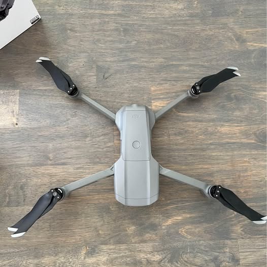 DJI Mavic Air 2 drone with four folded propellers, white body