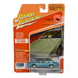 1:64 diecast Aston Martin model car in blister packaging, teal with black wheels