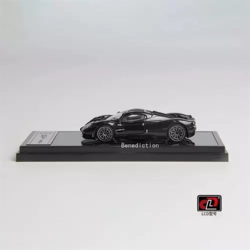 Pagani Utopia 1:64 diecast model car in black on display base
