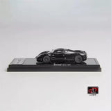 Pagani Utopia 1:64 diecast model car in black on display base