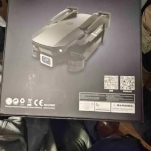 Obstacle-avoidance drone illustration on gray product box