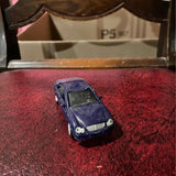 Blue Mercedes-Benz C-Class diecast car model