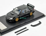 Black 1:64 diecast sedan model car with gold wheels, on display base and spare parts