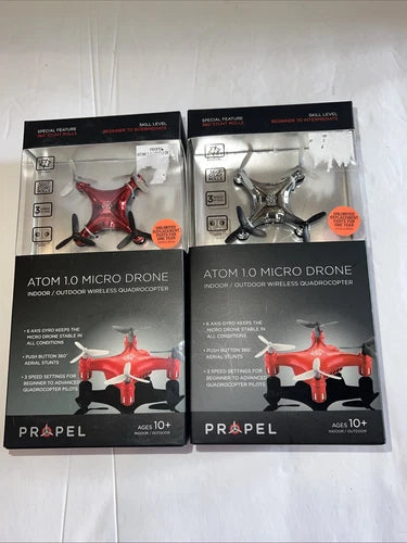 Boxed red and silver micro drone quadcopter two-pack