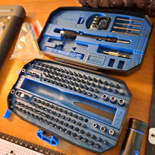 Precision screwdriver set with magnetic bit tray and blue storage case