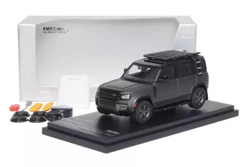 Diecast SUV model car on display base with accessories, dark gray/black
