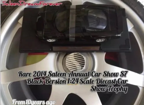 Black 1:24 scale diecast S7 show trophy car with detailed front grille and hood