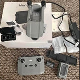 DJI Air 2 fly-more drone kit with controller, batteries, and accessories