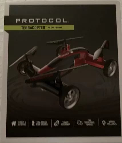 Red and black terracopter air and car drone with four wheels on display box