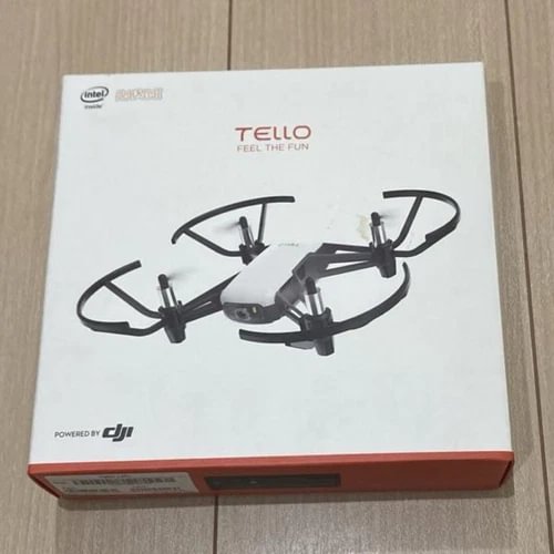 Tello quadcopter drone box with four-armed drone and folded propellers