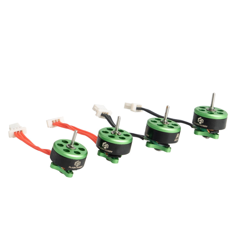 Brushless motor set with four green motors, shafts, and attached wiring