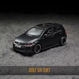 1:64 scale black 2017 Golf GTI hatchback diecast metal car toy, front 3/4 view