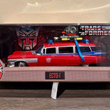 Red diecast Ecto-1 model car with blue equipment, in display packaging, front view