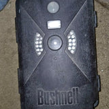 Trail camera front with Bushnell logo, lens, and IR LED array