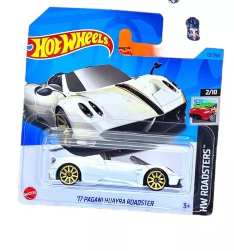 Pearl white diecast sports car model with black hood and gold wheels on blister pack
